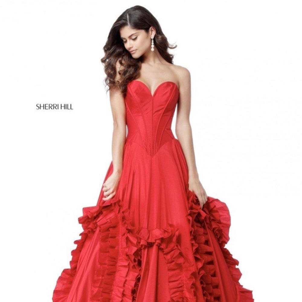 Sherri Hill 51578 is an extraordinary ball gown .